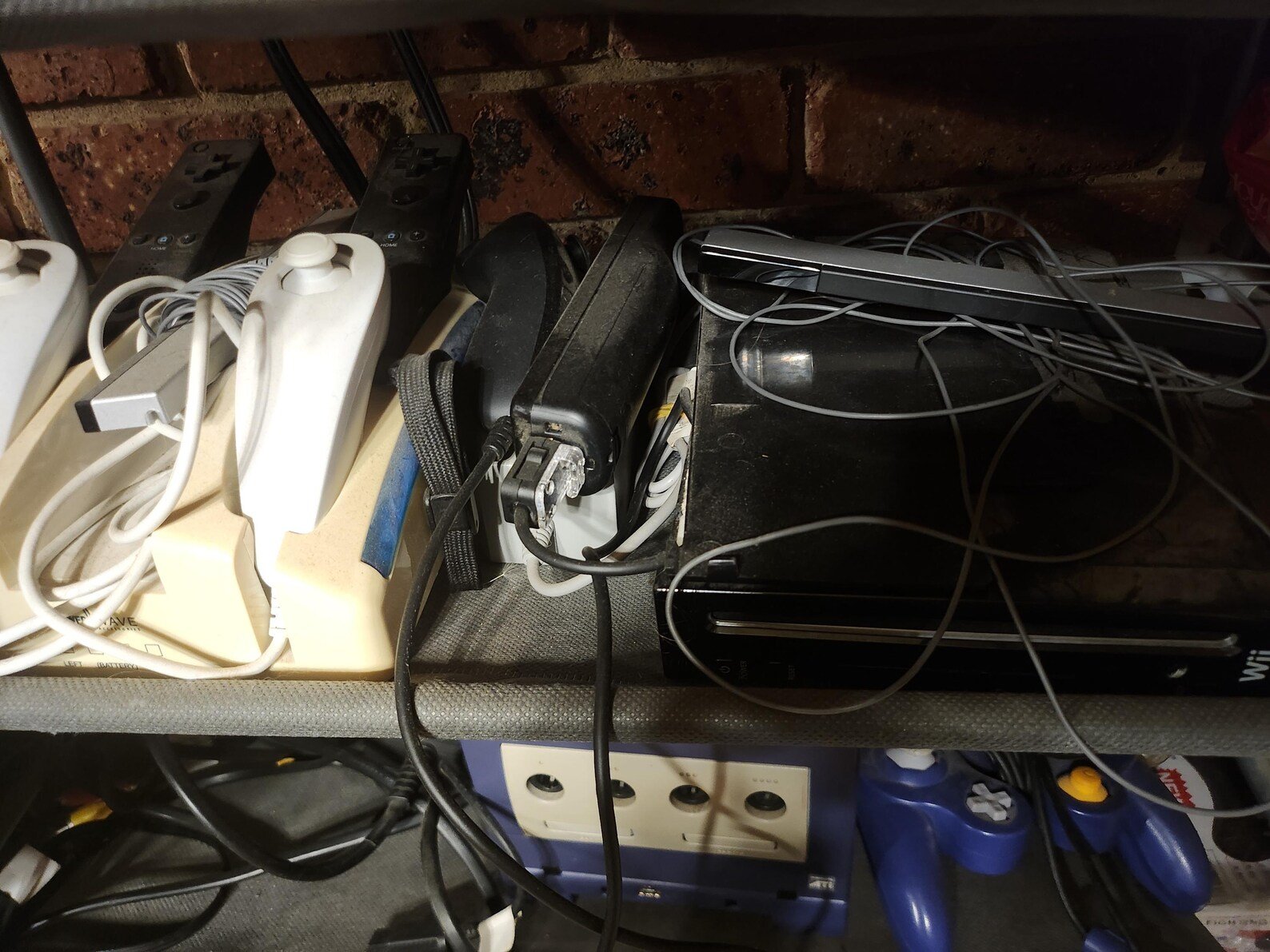 Nintendo wii with 4 controllets and many accessories such as controller charger stand